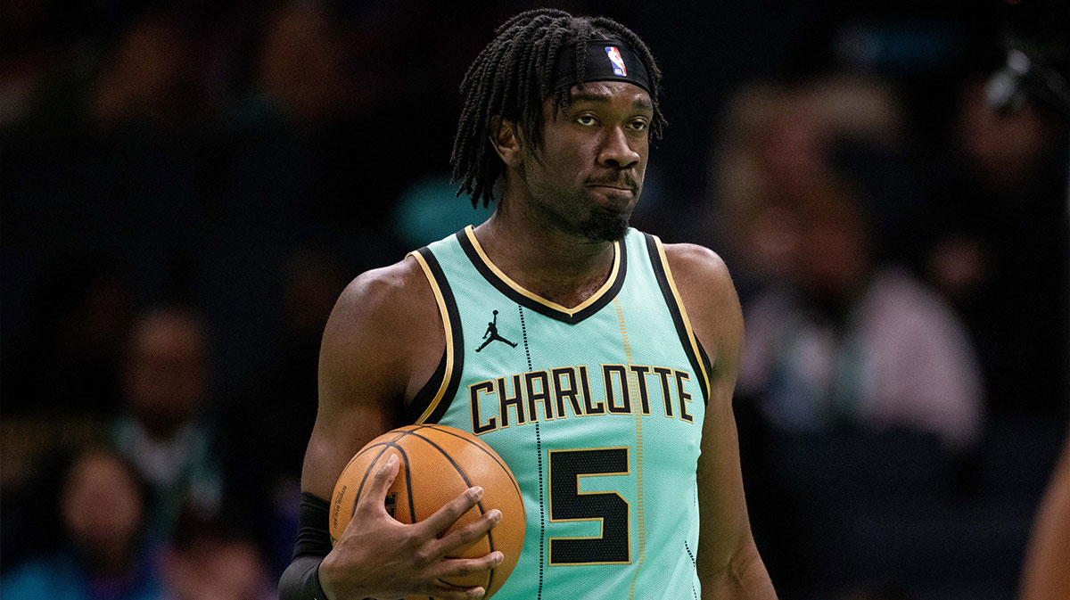 Jan 24, 2025; Charlotte, North Carolina, USA; Charlotte Hornets center Mark Williams (5) holds the ball against the Portland Trail Blazers during the second quarter at Spectrum Center. Mandatory Credit: Scott Kinser-Imagn Images