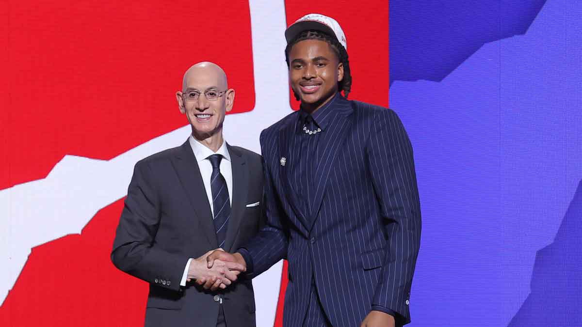 Collin Murray-Boyles stands with NBA commissioner Adam Silver after being selected as the ninth pick by the Toronto Raptors in the first round of the 2025 NBA Draft at Barclays Center.
