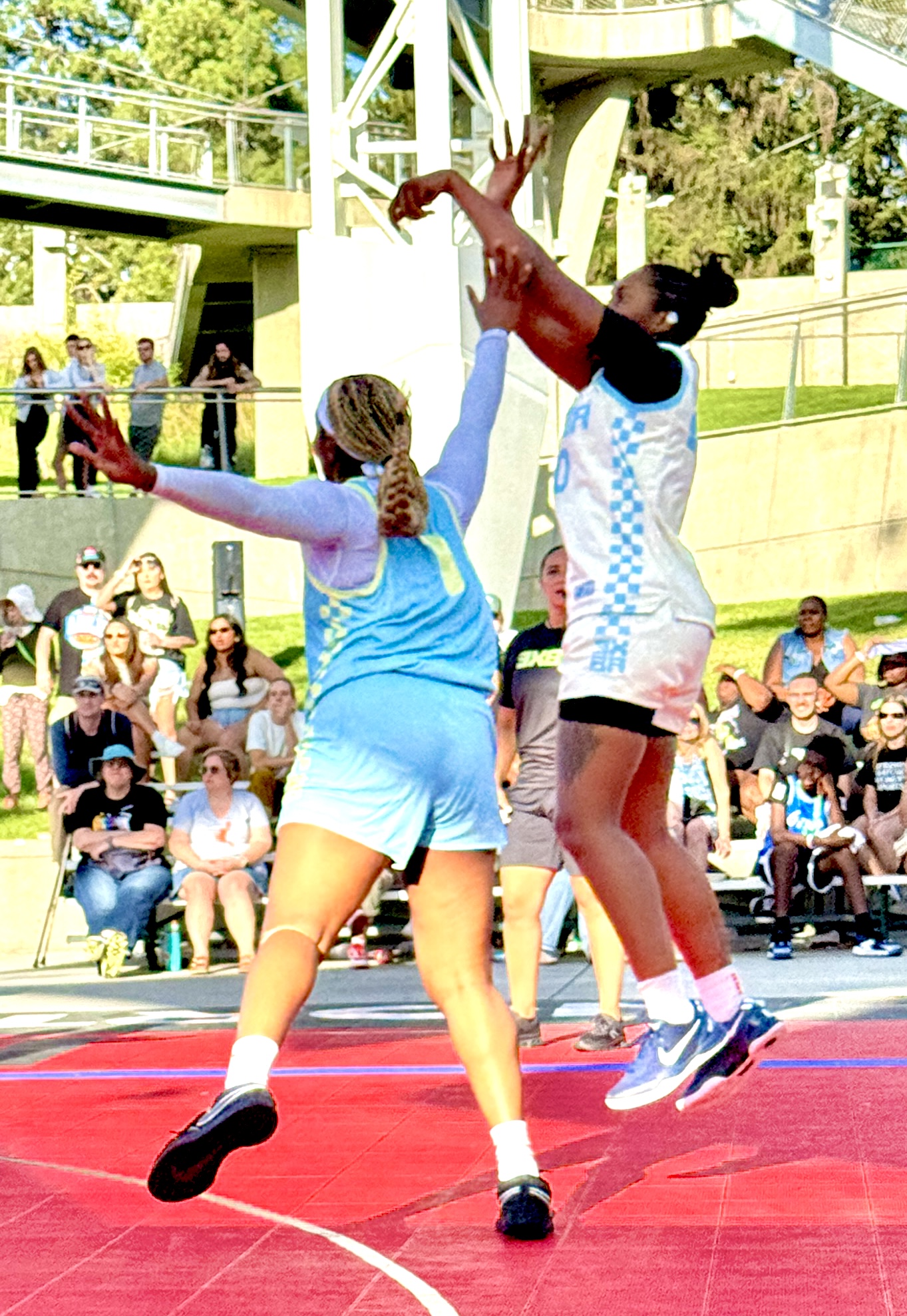 Amy Okonkwo of Team B&B contests a shot from behind the arc by Azana Baines at the 3XBA tournament at the Pavilion at Riverfront Park in Spokane, WA on June 28, 2025. (Photo credit: Steve Silverman | The Next)