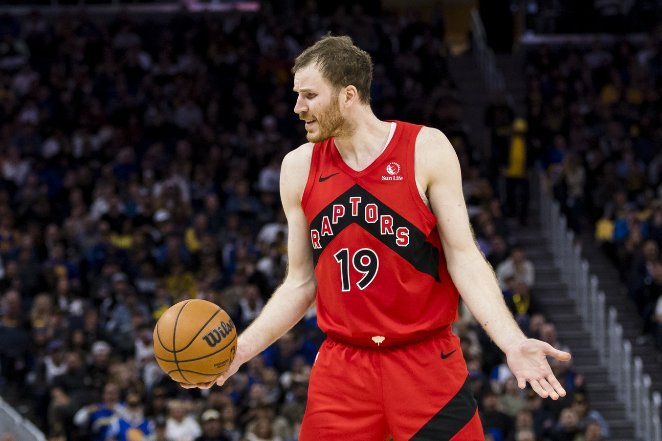 Toronto Raptors center Jakob Poeltl (19) reacts during the fourth quarter against the Golden State Warriors at Chase Center.