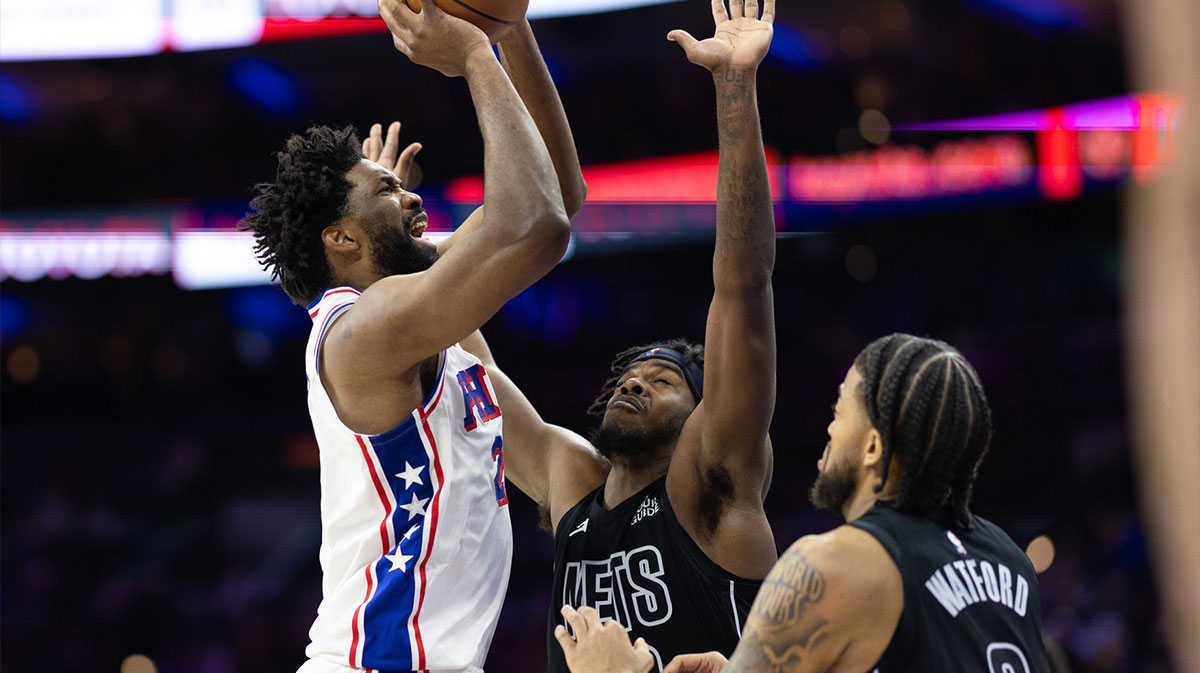 Philadelphia 76ers center Joel Embiid (21) drives for a shot against Brooklyn Nets center Day'Ron Sharpe (20) during the third quarter at Wells Fargo Center. 