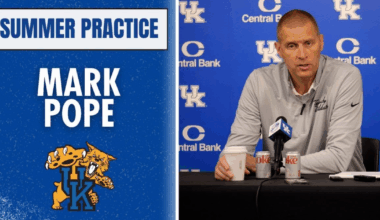 Mark Pope and Rick Pitino talk on the sideline at Kroger Field - Dr. Michael Huang, Kentucky Sports Radio