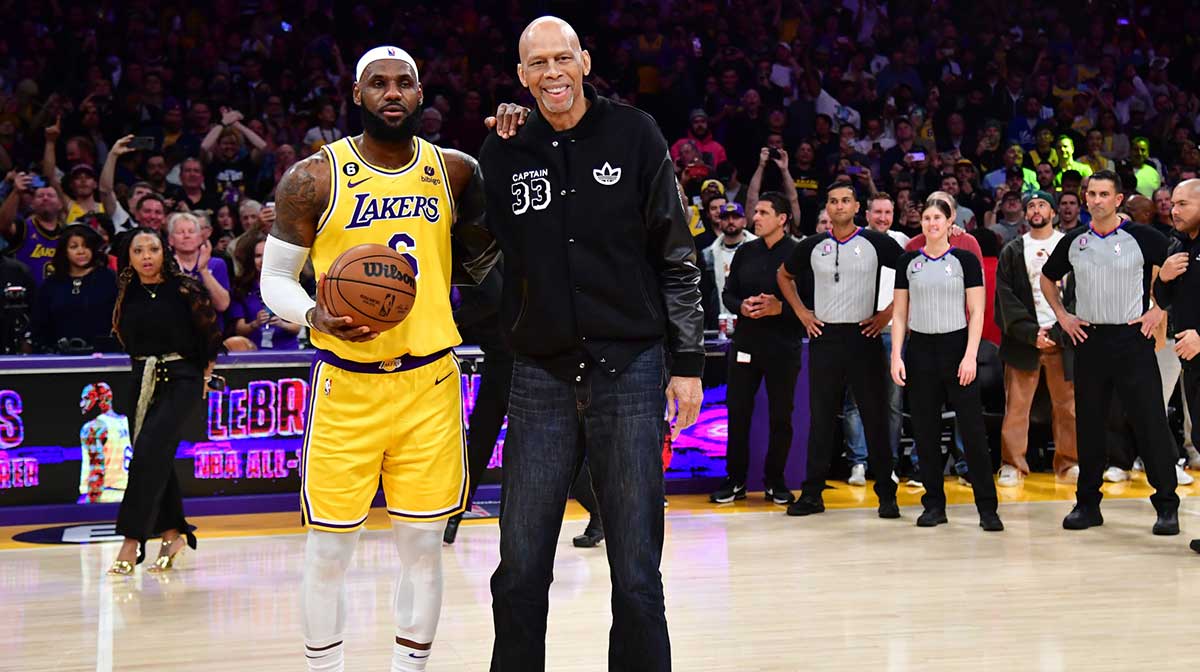 Los Angeles Lakers forward LeBron James (6) celebrates former Lakers player Kareem Abdul-Jabbar after breaking the record for all-time scoring in the NBA during the third quarter against the Oklahoma City Thunder at Crypto.com Arena.