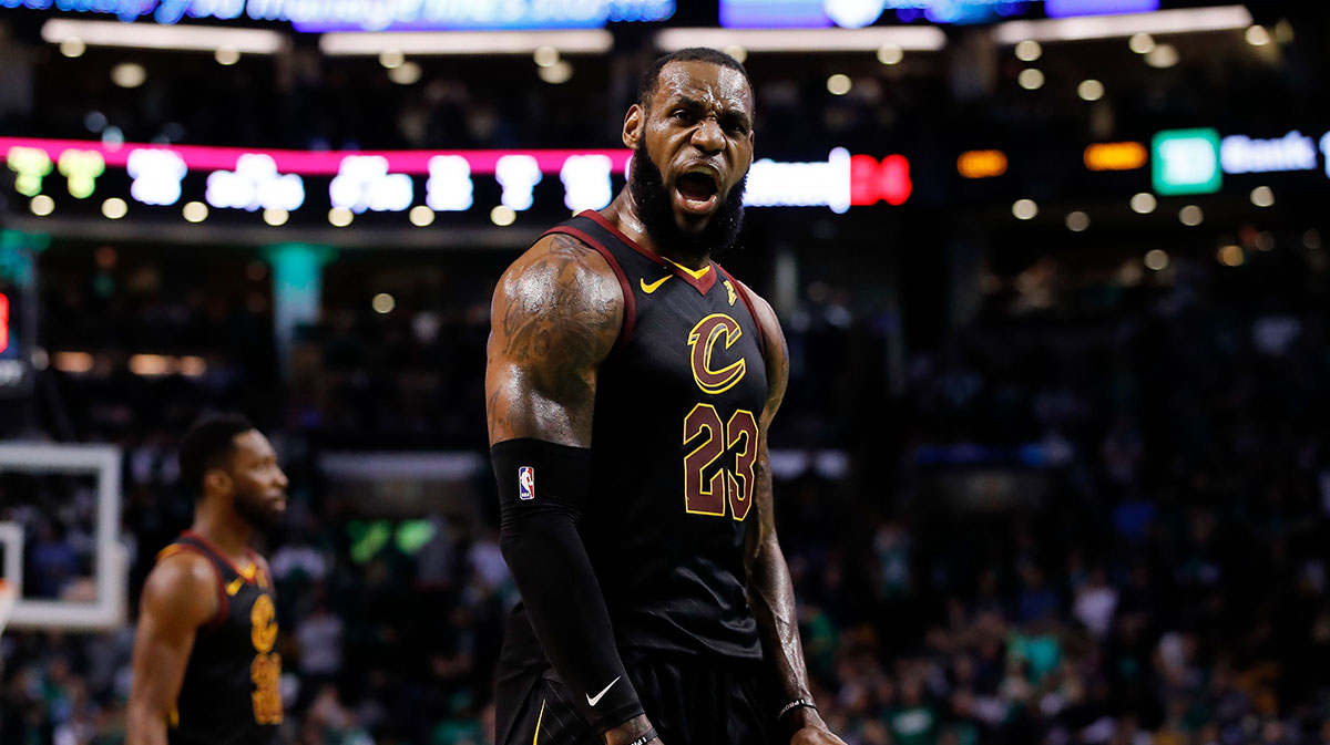Cleveland Cavaliers forward LeBron James (23) celebrates after drawing foul against the Boston Celtics during the fourth quarter in game seven of the Eastern conference finals of the 2018 NBA Playoffs at TD Garden.