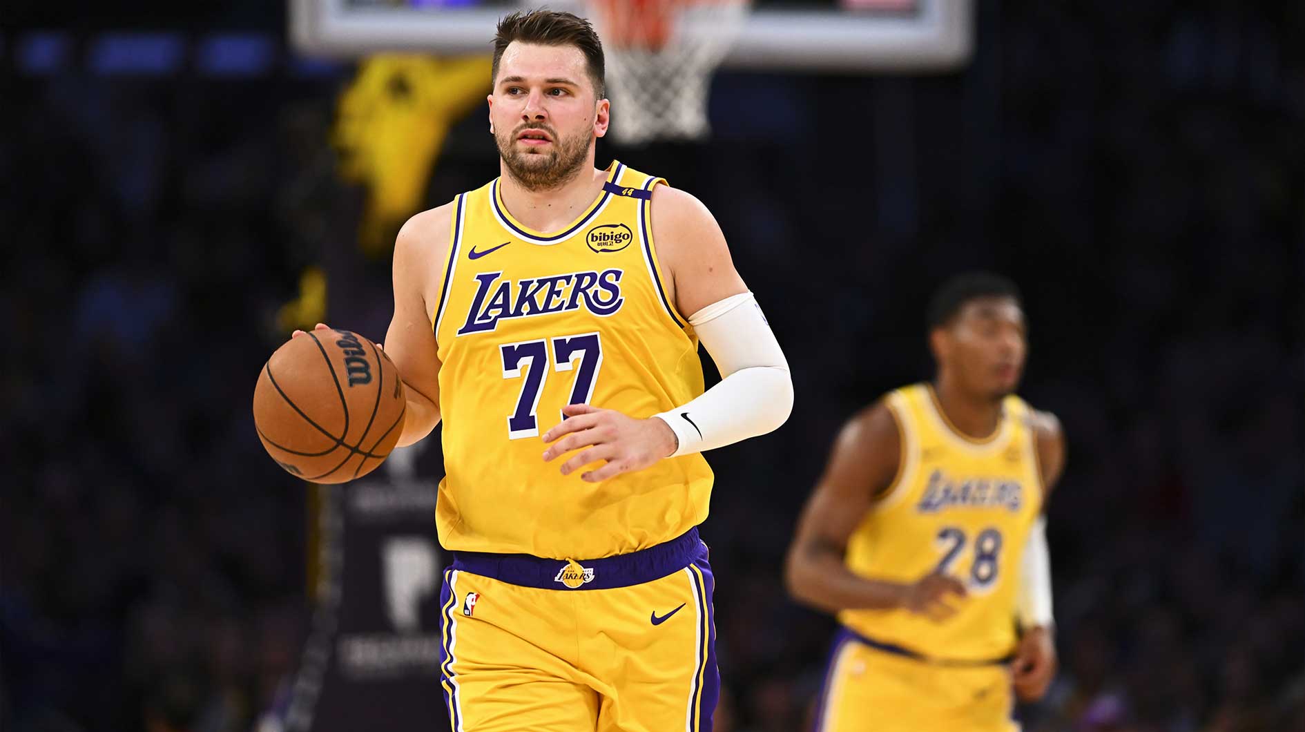 Los Angeles Lakers guard Luka Doncic (77) moves the ball against the Houston Rockets during the first half at Crypto.com Arena.