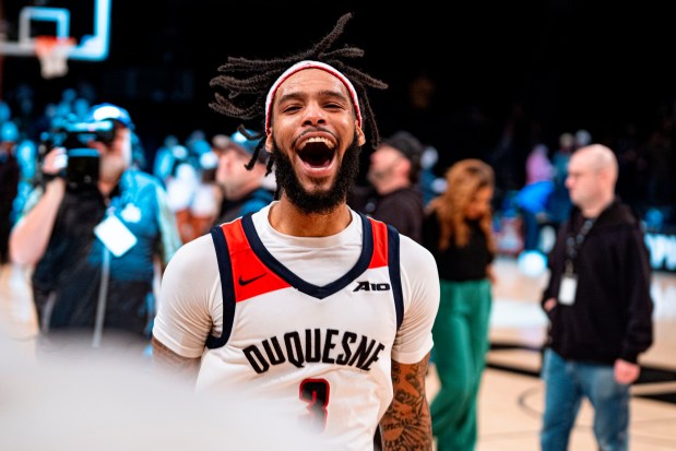 Duquesne's Dae Dae Grant reacts after his team defeated St. Bonaventure in the semifinal round of the Atlantic 10 Conference tournament on March 16, 2024, in New York. (Peter K. Afriyie - The Associated Press)