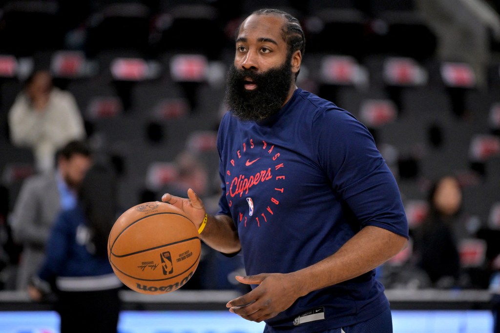 James Harden of the Los Angeles Clippers holding a basketball.