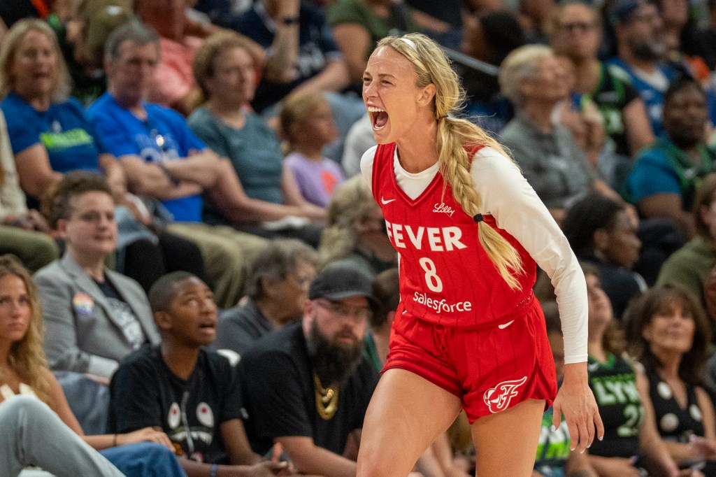 Indiana Fever guard Sophie Cunningham (8) celebrates after making a three point shot against the Minnesota Lynx in the second half during the Commissioner's Cup final at Target Center. 