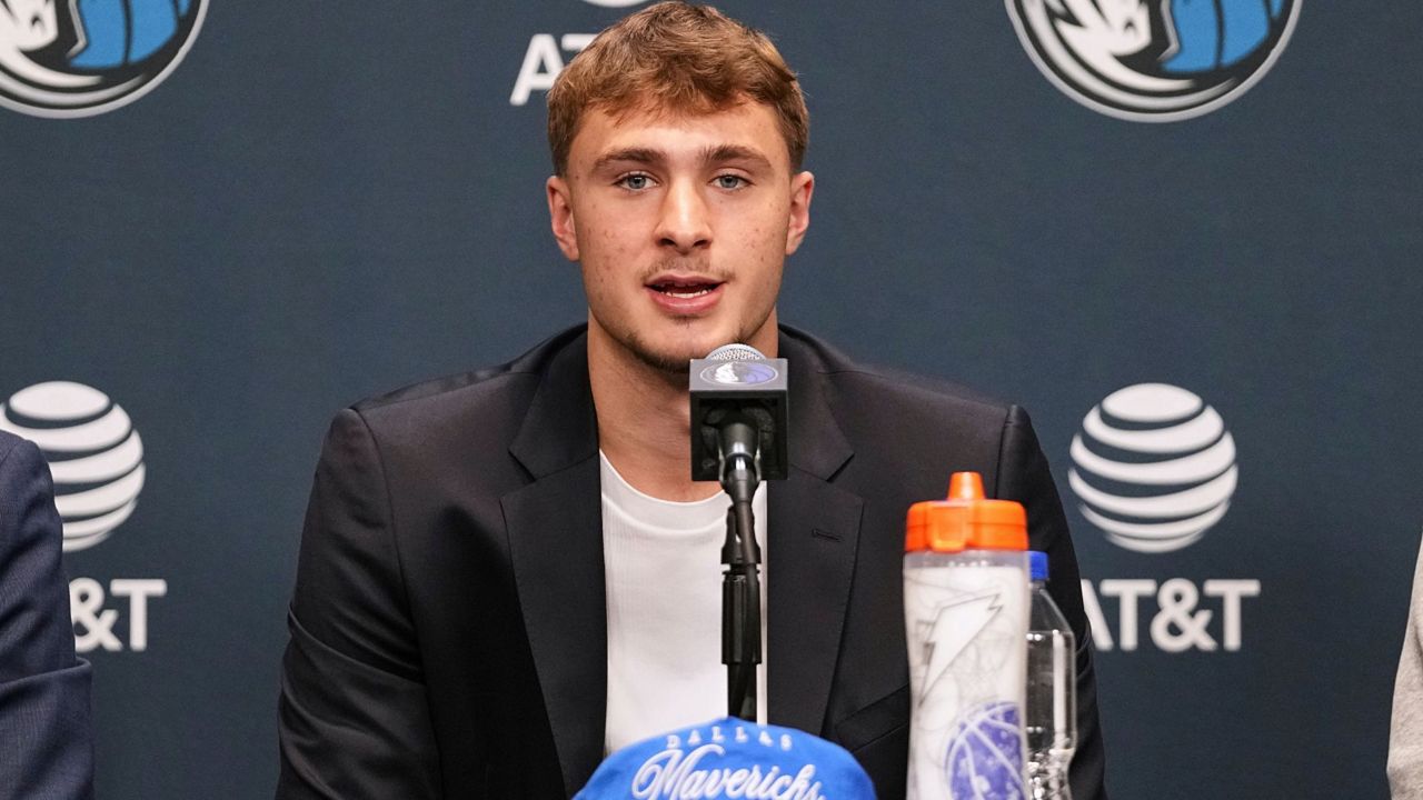 Dallas Mavericks' Cooper Flagg, the No. 1 overall pick in the NBA draft, speaks during an NBA basketball press conference at the team's practice facility, Friday, June 27, 2025, in Dallas. (AP Photo/Tony Gutierrez)