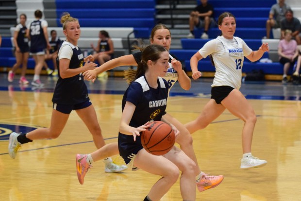 The girls' basketball teams from Allen Park Cabrini and Gibraltar...