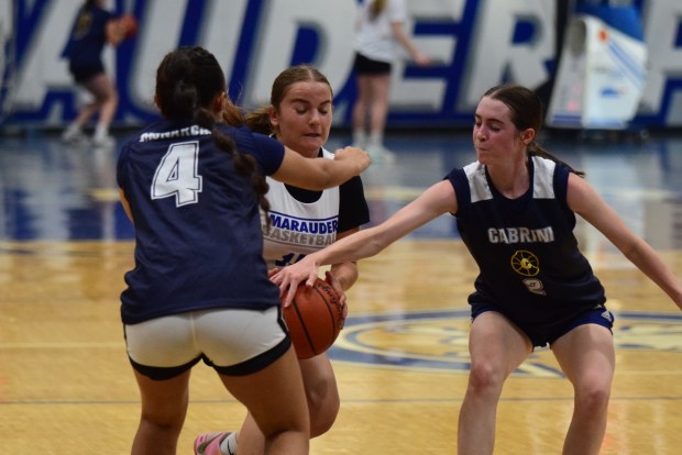 The girls' basketball teams from Allen Park Cabrini and Gibraltar...