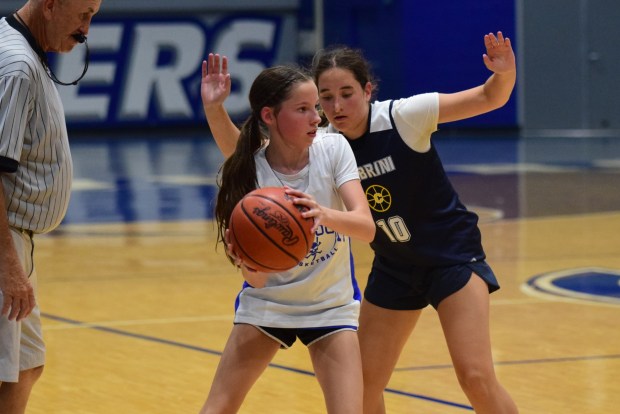 The girls' basketball teams from Allen Park Cabrini and Gibraltar...