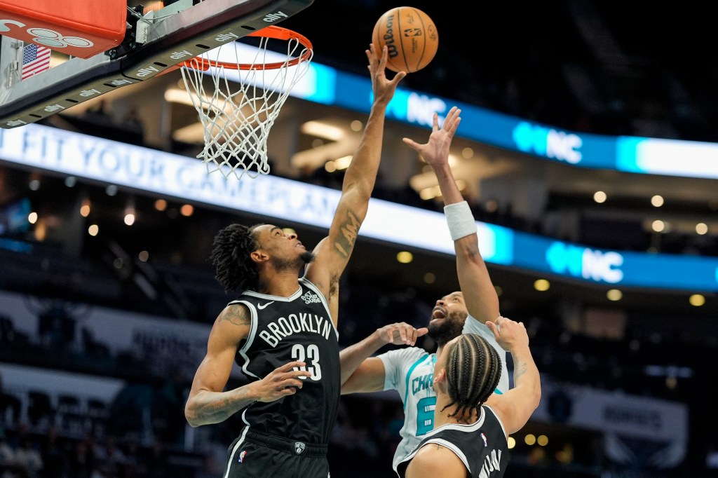 Nic Claxton blocks Taj Gibson's shot during the Nets' 104-83 win over the Hornets on Jan. 29, 2025.