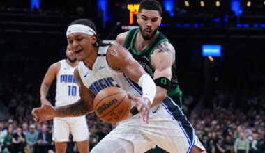 Boston Celtics forward Jayson Tatum (0) defends against Orlando Magic forward Paolo Banchero (5) in the second quarter during game five of first round for the 2025 NBA Playoffs at TD Garden.