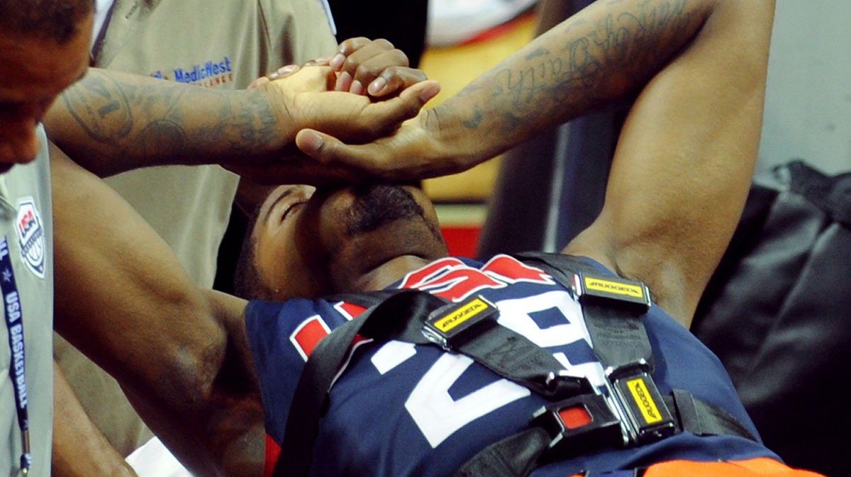 Team USA guard Paul George is carted off the floor on a gurney after suffering a lower leg injury during the USA Basketball Showcase at Thomas & Mack Center.