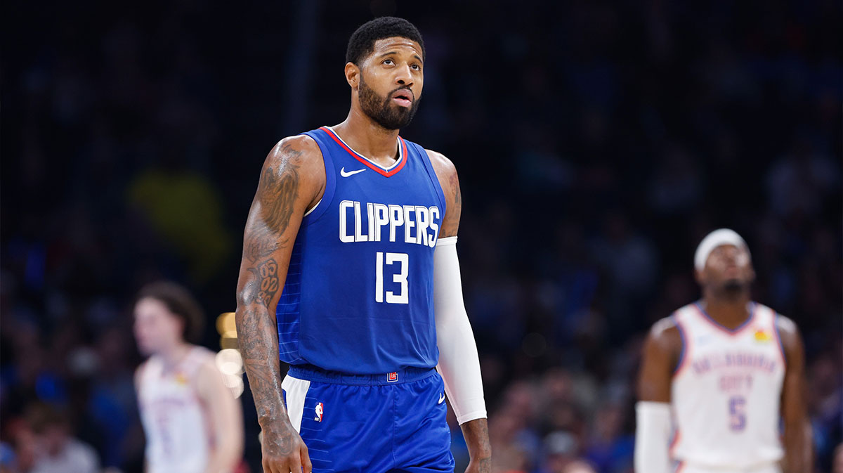 LA Clippers forward Paul George (13) looks down court during a time out against the Oklahoma City Thunder during the second quarter at Paycom Center.