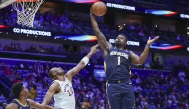 New Orleans Pelicans forward Zion Williamson (1) pulls down a defensive rebound against San Antonio Spurs center Bismack Biyombo (18) in the first half of an NBA basketball game in New Orleans, Sunday, Feb. 23, 2025. (AP Photo/Peter Forest)