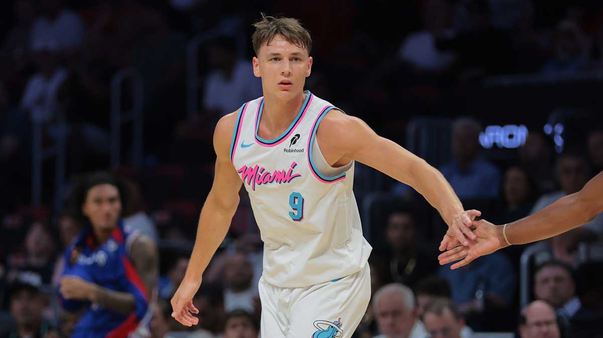 Miami Heat guard Pelle Larsson (9) celebrates after scoring against the Philadelphia 76ers during the first quarter at Kaseya Center.