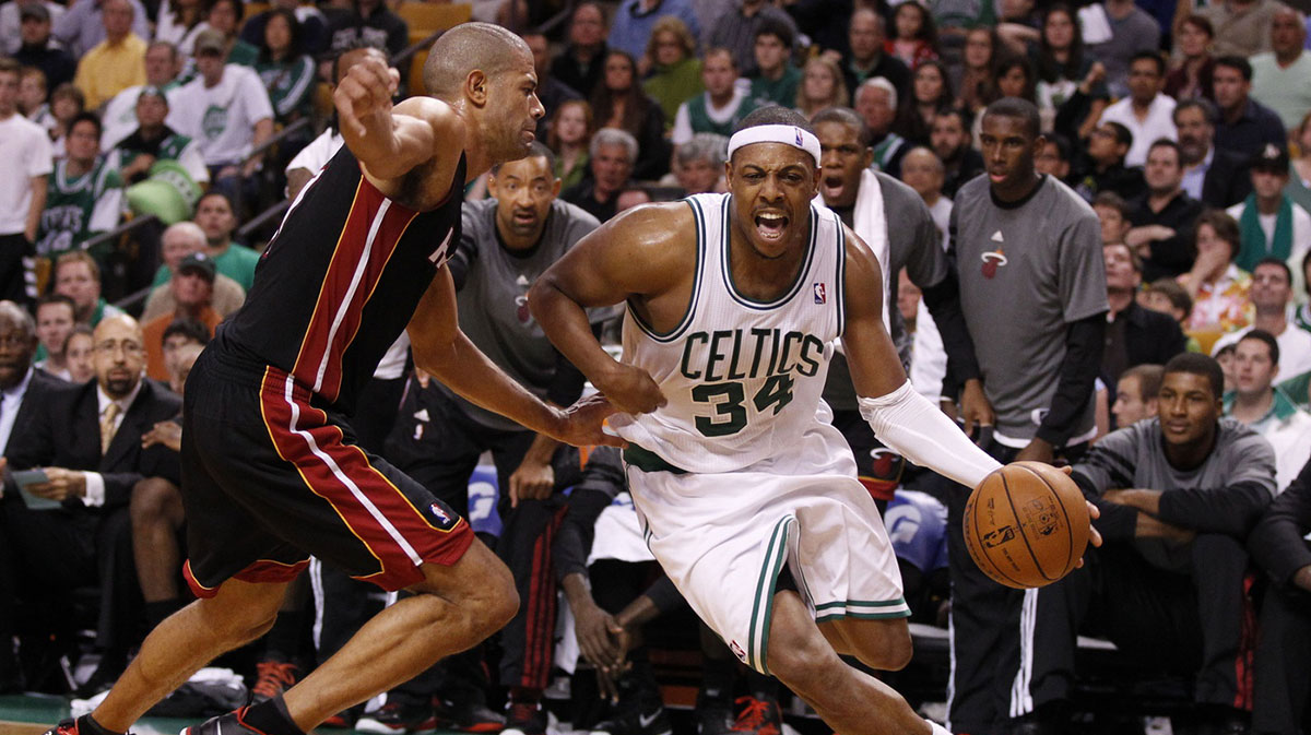 Boston Celtics small forward Paul Pierce (34) drives the ball against Miami Heat small forward Shane Battier (31) during the second half in game four of the Eastern Conference finals of the 2012 NBA playoffs at TD Garden. The Celtics defeated the Heat in overtime 93-91.
