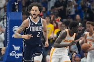 Dallas Mavericks center Dereck Lively II yells after scoring against Atlanta Hawks forward...