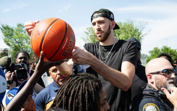 Standing head and shoulders above the crowd, Twin Cities native...