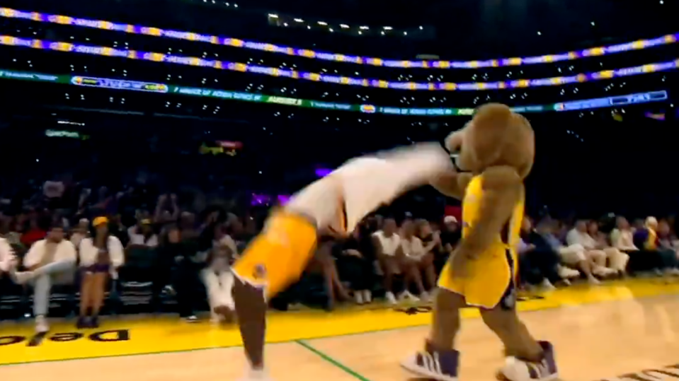 Sparky the mascot was caught in the crossfire of an unsuspecting dancer