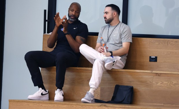 Orlando Magic head coach Jamahl Mosley, left, talks to summer...
