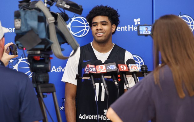 Orlando Magic guard Jase Richardson speaks during a press conference...