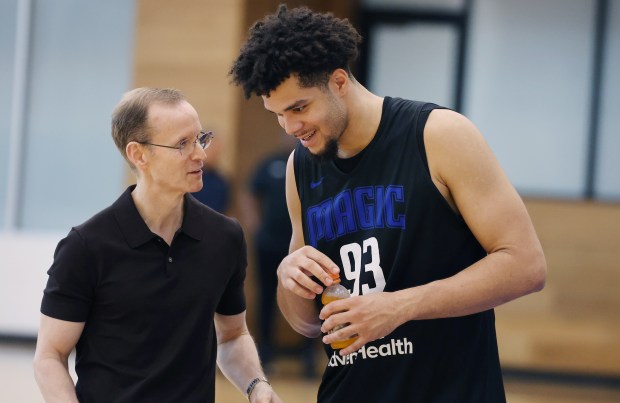 Orlando Magic player Noah Penda (93) talks to Orlando Magic...