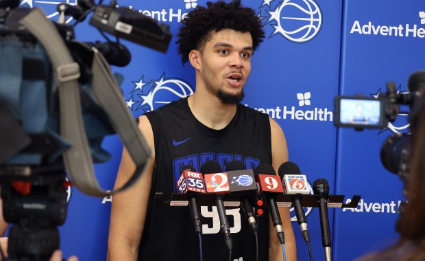 Orlando Magic player Noah Penda speaks during a press conference...