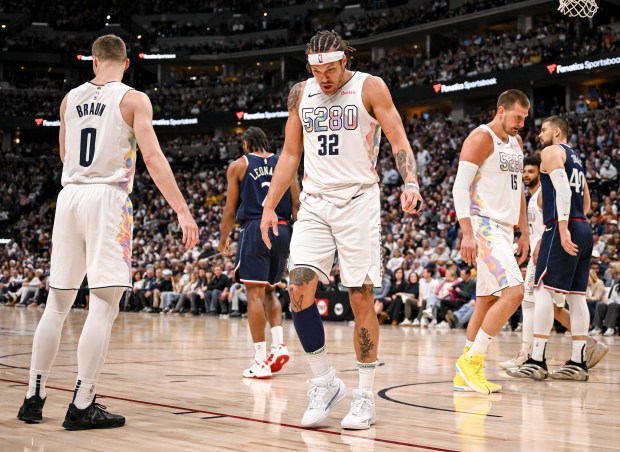 Aaron Gordon (32) of the Denver Nuggets reacts to fouling...