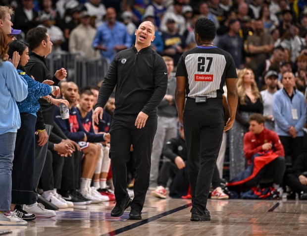 Head coach Ty Lue reacts as referee Mitchell Ervin (27)...