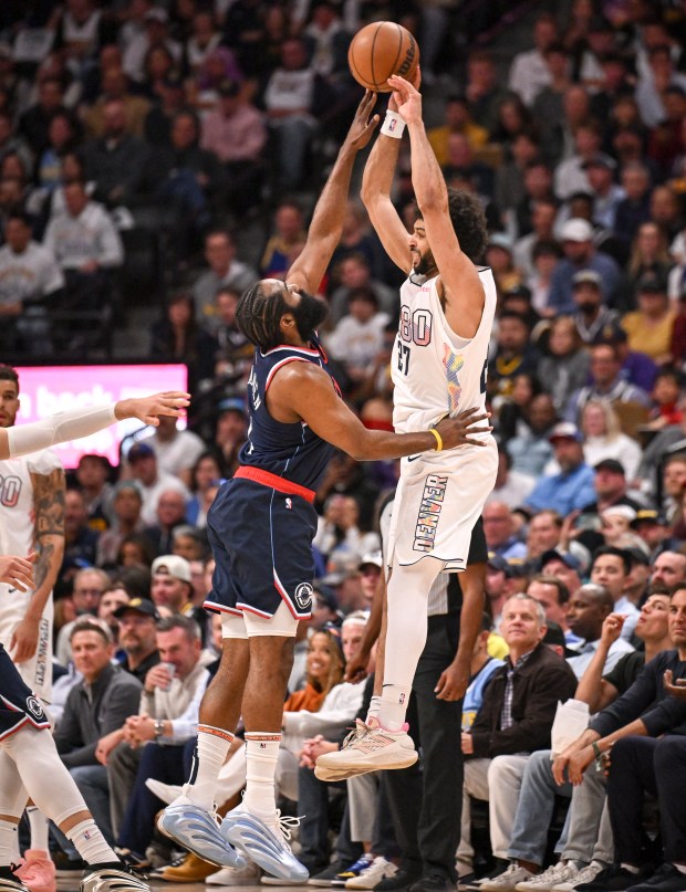 Jamal Murray (27) of the Denver Nuggets passes as James...