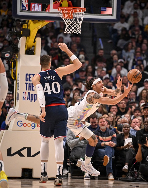 Ivica Zubac (40) of the LA Clippers fouls Aaron Gordon...