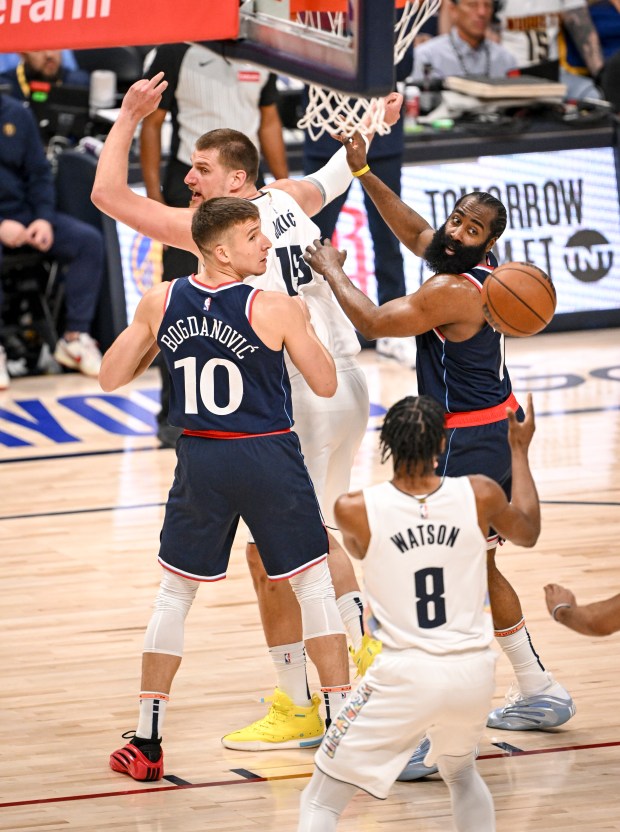 Nikola Jokic (15) of the Denver Nuggets throws a blind...