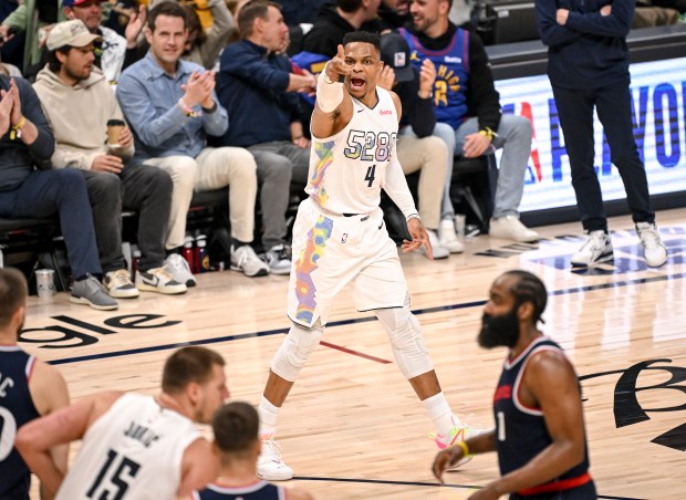 Russell Westbrook (4) of the Denver Nuggets celebrates after burying...
