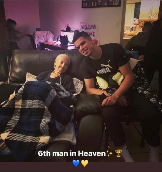 Former Nuggets forward Michael Porter Jr. (right) poses with fan Janice Jackson at Jackson's home in January 2022. Jackson passed away in February 2022 but was overjoyed with Porter's surprise visit. Porter and Jackson's family watched the Nuggets beat the Nets in Brooklyn that night. Ironically, Porter would be traded to Brooklyn three years later. (Photo courtesy Ashley Salvador)