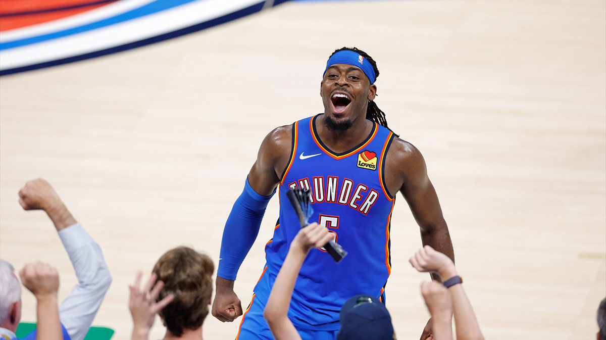 Thunder guard Lu Dort (5) celebrates after a play against the Indiana Pacers during the second half during game seven of the 2025 NBA Finals at Paycom Center