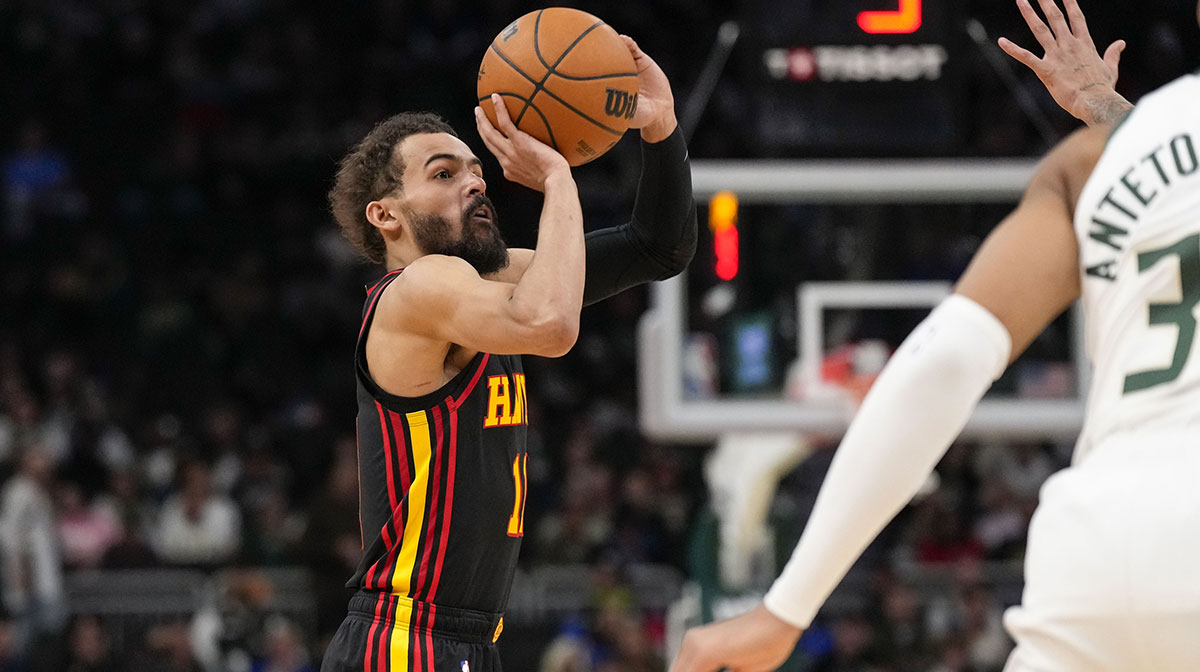 Atlanta Hawks guard Trae Young (11) shoots during the third quarter against the Milwaukee Bucks at Fiserv Forum.
