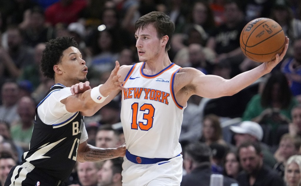 Tyler Kolek, who had five points and five assists, looks to make a pass during the Knicks' win over the Bucks. 