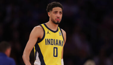 Indiana Fever guard Caitlin Clark (22) claps Thursday, July 3, 2025, during team introductions at a game between the Indiana Fever and the Las Vegas Aces at Gainbridge Fieldhouse in Indianapolis.