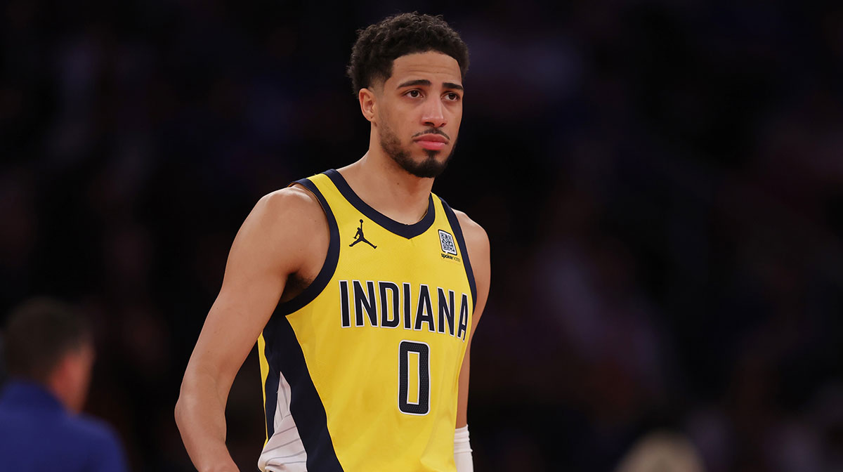Indiana Fever guard Caitlin Clark (22) claps Thursday, July 3, 2025, during team introductions at a game between the Indiana Fever and the Las Vegas Aces at Gainbridge Fieldhouse in Indianapolis.