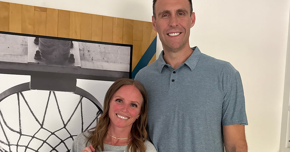 Basketball wife Lesa Burgess' book a testament to resilience – Deseret News