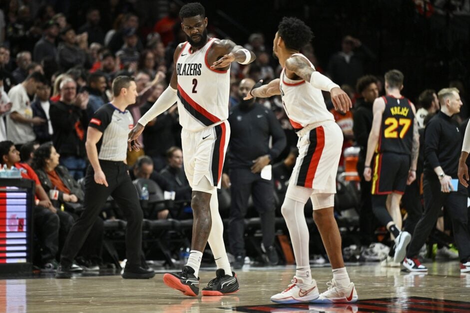 Deandre Ayton of the Portland Trail Blazers celebrated with teammate Anfernee Simons