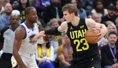 Oct 25, 2024; Salt Lake City, Utah, USA; Utah Jazz forward Lauri Markkanen (23) posts up on Golden State Warriors forward Jonathan Kuminga (00) during the second quarter at Delta Center. Mandatory Credit: Rob Gray-Imagn Images