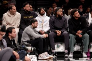 Jan 6, 2025; Brooklyn, New York, USA; Brooklyn Nets forward Bojan Bogdanovic (44) and guards Ben Simmons (10) and Cam Thomas (24) and forwards Trendon Watford (9) and Cameron Johnson (2) watch from the bench during the fourth quarter against the Indiana Pacers at Barclays Center.