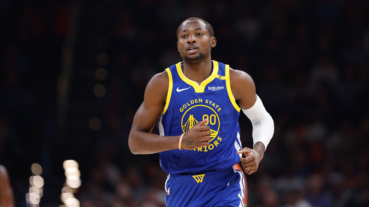 Golden State Warriors forward Jonathan Kuminga (00) runs down the court against the Oklahoma City Thunder during the second quarter at Paycom Center.