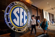 Media members convene during Southeastern Conference NCAA college football media days...