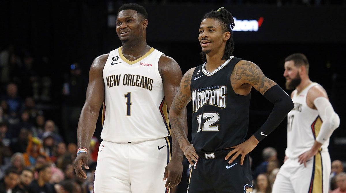 New Orleans Pelicans forward Zion Williamson (1) and Memphis Grizzlies guard Ja Morant (12) talk during free throws during the second half at FedExForum.