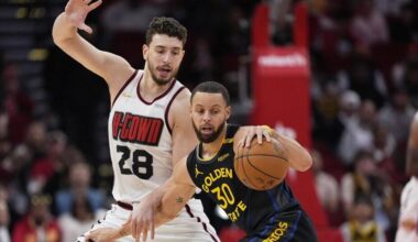 Curry scores 27 points to lead the Warriors to a 105-98 win over the Rockets